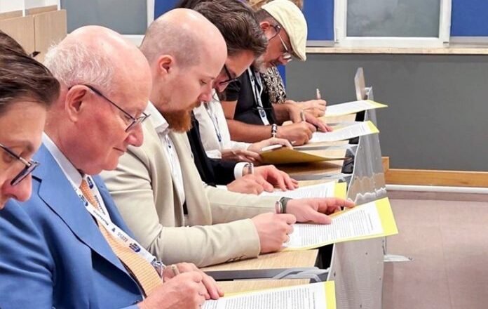 Religious-scholars-signing-an-appeal-requesting-an-end-to-Chairman-Lees-detention-696x464